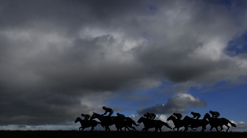 Horses make their way down the backstretch during a race held Thursday, January 15, at the Wincanton Racecourse in Wincanton, England. <a href="index.php?page=&url=http%3A%2F%2Fwww.cnn.com%2F2015%2F01%2F13%2Fsport%2Fgallery%2Fwhat-a-shot-0113%2Findex.html" target="_blank">See 37 amazing sports photos from last week</a>