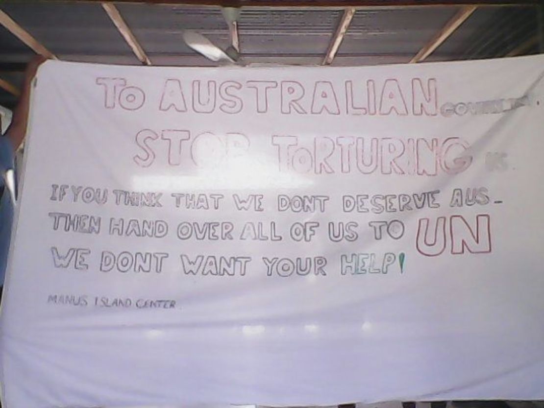 An image of a sign hanging in one of the compounds at the Manus Island detention center, Tuesday, January 20.
