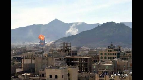 Smoke and flames rise in Sanaa during heavy clashes between presidential guards and Houthi rebels on January 19.