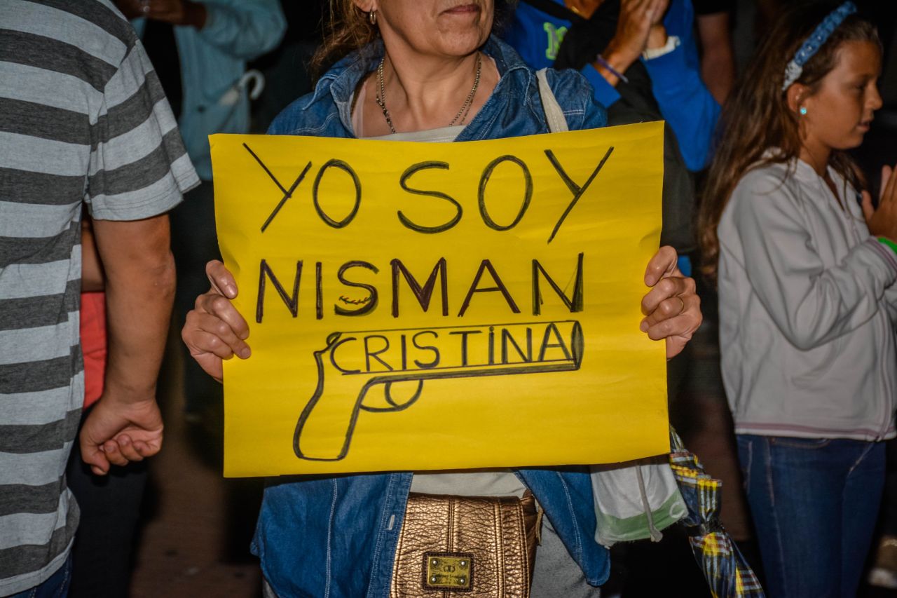 "I am Nisman," reads a <a href="http://ireport.cnn.com/docs/DOC-1208078">protest sign</a>.