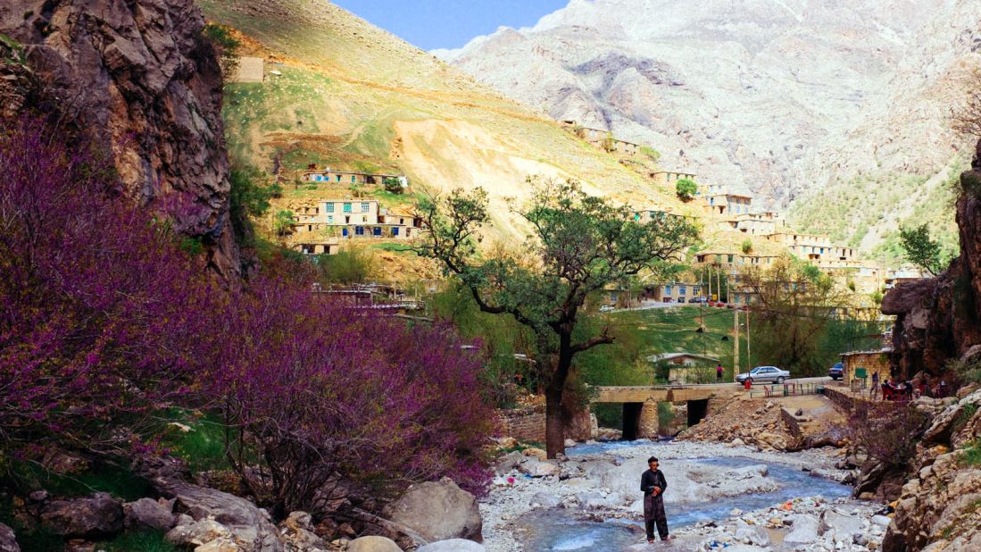 A Sunni man prays in a river in the Hawraman Valley, a predominantly Kurdish area that extends into northern Iraq.