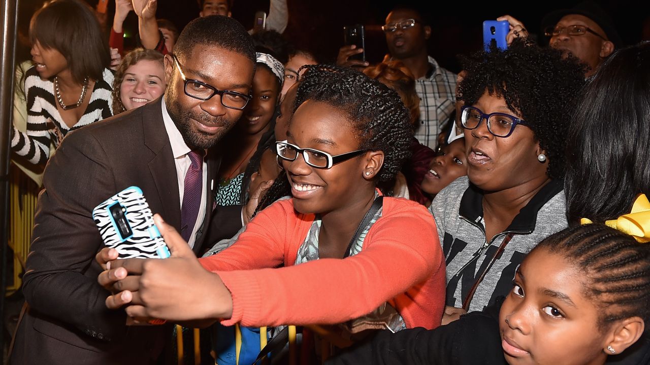 Actor David Oyelowo takes a selfie with a fan in Selma, Alabama, at a screening of the movie "Selma" on Sunday, January 18.