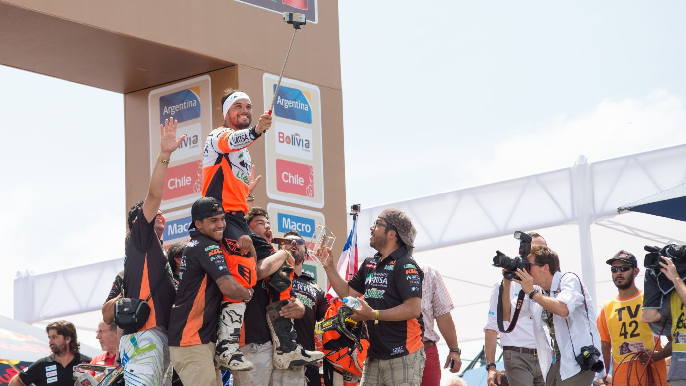 Marc Coma uses a selfie stick after winning the motorcycle class of the Dakar Rally, which ended Saturday, January 17, in Buenos Aires. <a href="http://www.cnn.com/2015/01/14/living/gallery/look-at-me-selfies-0114/index.html" target="_blank">See 20 selfies from last week</a>