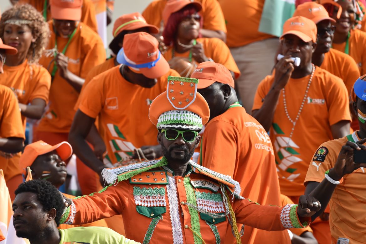 Ivory Coast supporters added more color off the pitch than their team did on it. A team that includes Manchester City's Yaya Toure produced a lackluster performance against Guinea.   