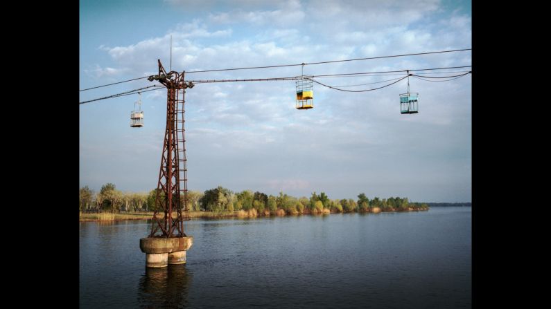 A Soviet-era cable car operates over the Dnieper River in Dnipropetrovsk.