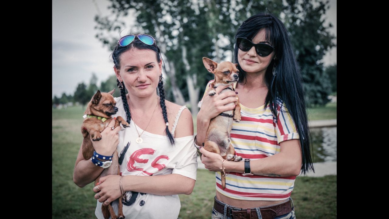 Ukranian women pose with their dogs in Cherkasy.