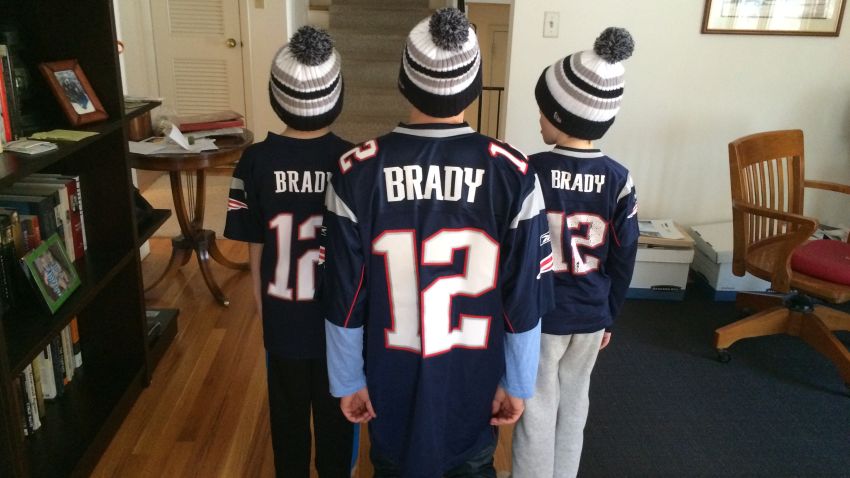 John Berman, with his twin sons, has been a lifelong New England Patriots fan.