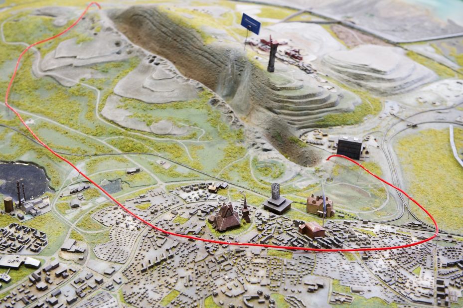 A scale model of Kiruna with the area of the city that will be impacted marked within the red wire.