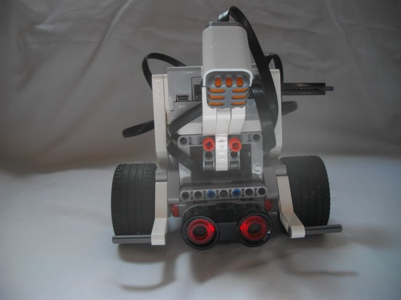With the worm's nose neurons replaced by a sonar sensor and the motor neurons running down both sides of the worm replicated on the left and right motors of the Lego bot, the robot could emulate the worm's biological wiring.