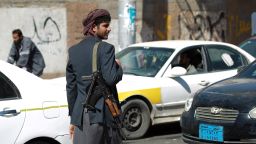A Houthi mans a checkpoint near the presidential palace in Sanaa on January 21.
