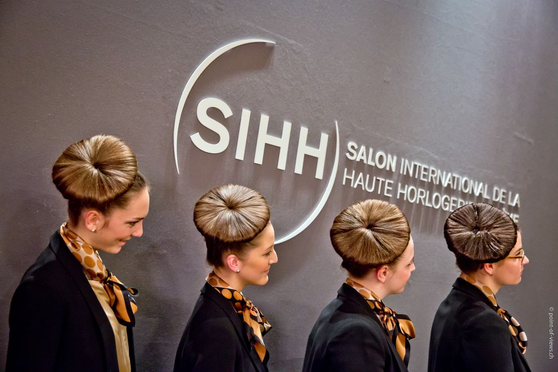 Attendees at SIHH were greeted by  neatly dressed hostesses, whose hair had even been fashioned to the shape of a watch.