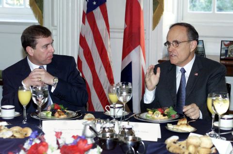In 2001, Prince Andrew became a UK trade envoy. He is pictured here with New York City Mayor Rudolph Giuliani the same year.