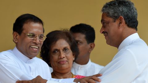 President Maithripala Sirisena (L) with Sarath Fonseka during campaigning in Colombo on Dec. 1, 2014