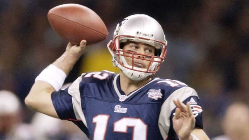 03 Feb 2002:   Quarterback Tom Brady of the New England Patriots throws a pass during the game against the St.Louis Rams at Superbowl XXXVI at the Superdome in New Orleans, Louisiana.  The Patriots won 20-17, with a 48-yard field goal by kicker Adam Vinatieri with 10 seconds left in the game . DIGITAL IMAGE. Mandatory Credit: Ezra Shaw/Getty Images