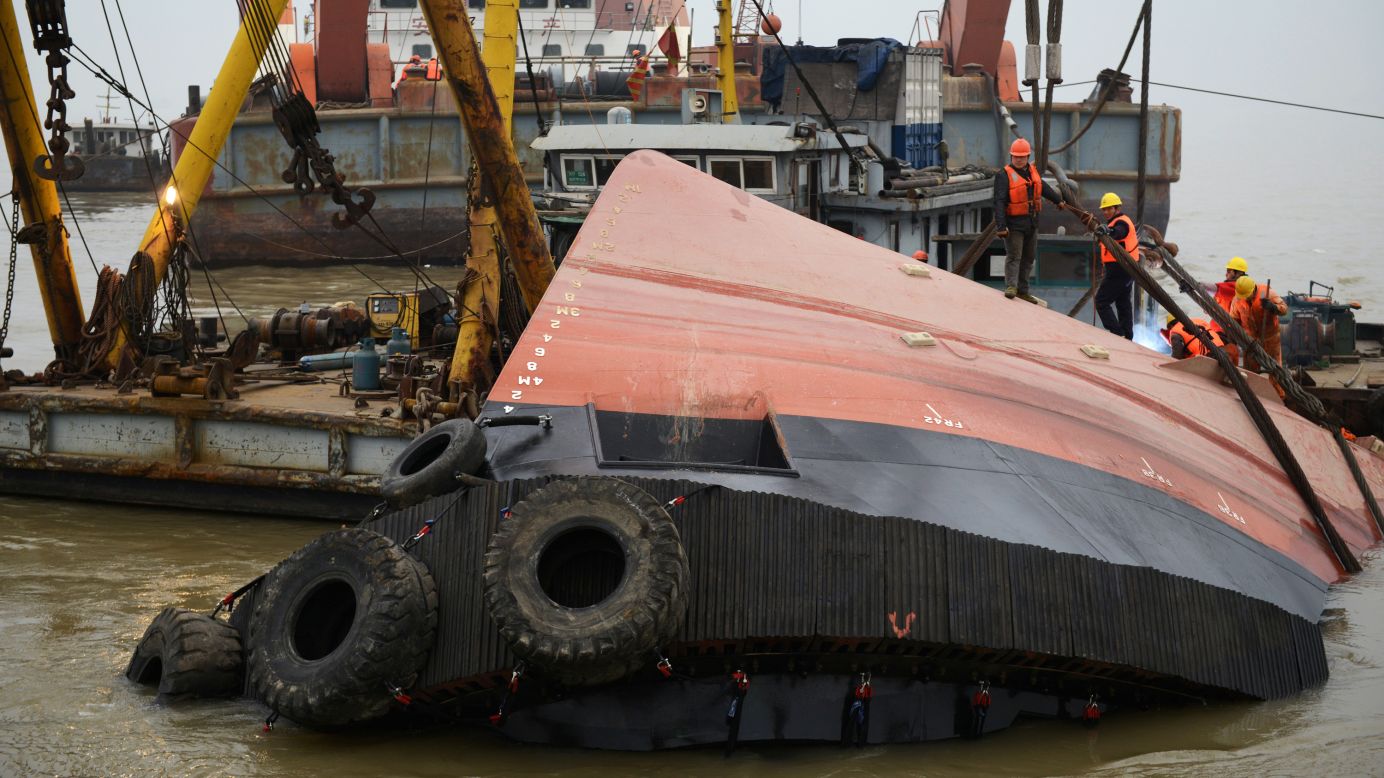 Rescue workers in Jingjiang, China, gather at a tugboat that <a href="http://www.cnn.com/2015/01/16/world/yangtze-river-tug-boat-sinking/index.html" target="_blank">sank in the Yangtze River</a> on Thursday, January 15. At least 21 people died and one more was missing, state media reported.