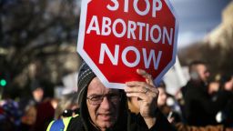 WASHINGTON, DC - JANUARY 22: A pro-life activist holds a sign as he participates in the annual March for Life January 22, 2015 in Washington, DC. Pro-life activists gathered in the nation's capital to mark the 1973 Supreme Court Roe v. Wade decision that legalized abortion. (Photo by Alex Wong/Getty Images)