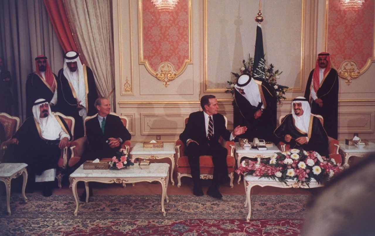 Seated from left, Prince Abdullah, U.S. Secretary of State Jim Baker, U.S. President George H.W. Bush and Saudi King Fahd discuss the Gulf crisis in November 1990.