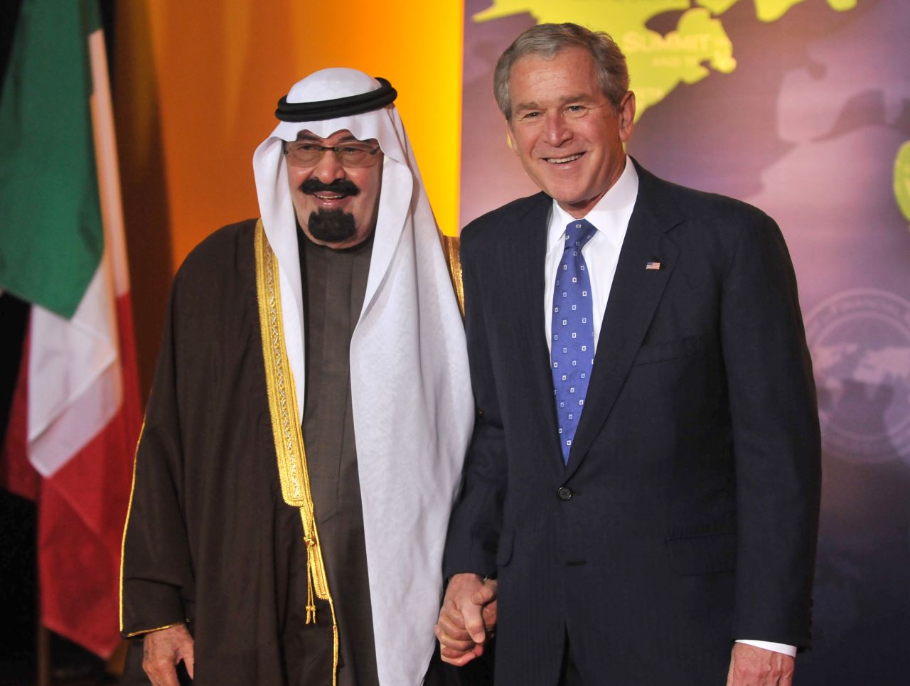 The King poses with U.S. President George W. Bush during an economic summit in Washington in November 2008.