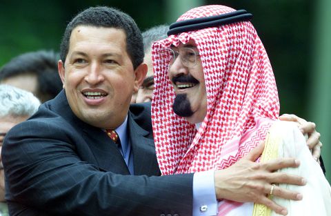 Venezuelan President Hugo Chavez hugs Prince Abdullah during a summit in Caracas, Venezuela, in September 2000.