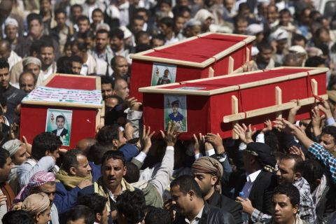 On Friday, January 23, Houthis carry coffins of those killed during recent clashes with presidential guard forces in Sanaa.