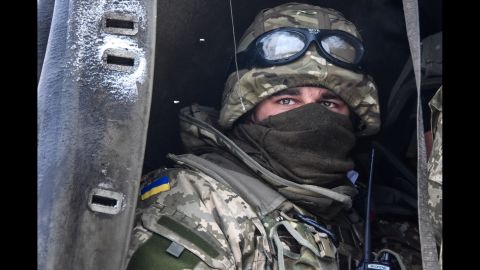 A Ukrainian soldier looks down from a military truck at the Donetsk airport on Tuesday, January 6. The airport has been the scene of some of the fiercest fighting in eastern Ukraine.