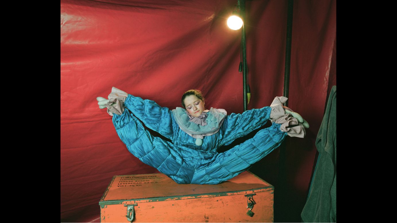 A clown from a traveling circus stretches backstage in Belgium. Dutch photographer Wiesje Peels has followed several circuses in Europe. The photos in her book "Mimus" capture a glimpse of the performers' "hidden life."