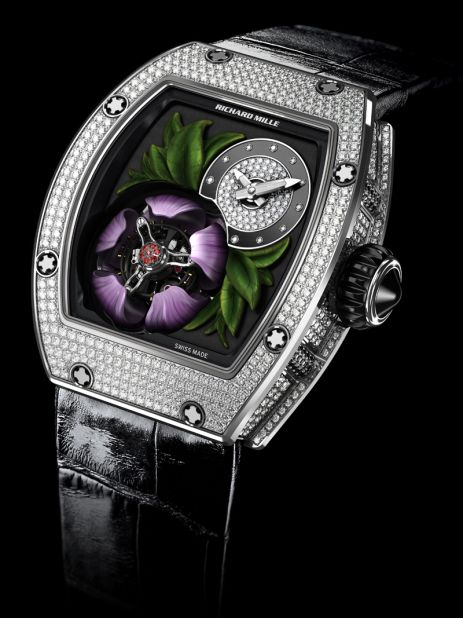 The 18-karat gold magnolia adorning the <a href="http://www.richardmille.com/" target="_blank" target="_blank">Richard Mille</a> RM 19-02 Tourbillon Fleur opens every five minutes to reveal the flying tourbillon inside.