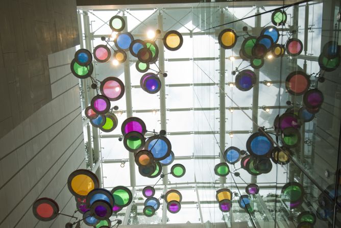 "ExoCentric Spirits #2" -- Commissioned for an elevator lobby in the Union Square development in Kowloon, Hong Kong, by MTR Limited. This large 48-ring structure was installed in 2007.
