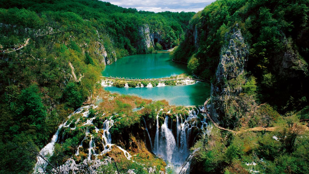 <strong>Plitvice Lakes, Croatia: </strong>Plitvice Lakes is a series of clear lakes in between rocky canyons and dramatic waterfalls.