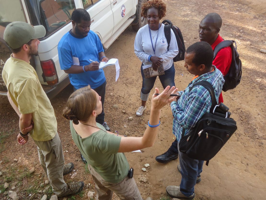 Peace Corps, CDC and WHO staff debrief with local partners following a visit to Bong County in Liberia. 