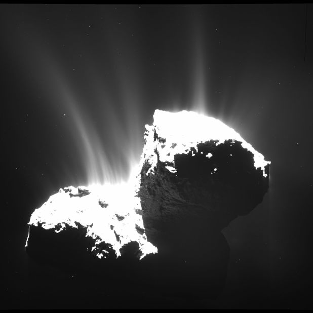 A camera on Rosetta took this picture of Comet 67P/Churyumov-Gerasimenko on November 22, 2014, from a distance of about 19 miles (31 kilometers). The nucleus is deliberately overexposed to reveal jets of material spewing from the comet. The 2.5-mile-wide (4-kilometer) comet has shown a big increase in the amount of water its releasing, according to NASA. The space agency says about 40 ounces (1.2 liters) of water was being sprayed into space every second at the end of August 2014. 