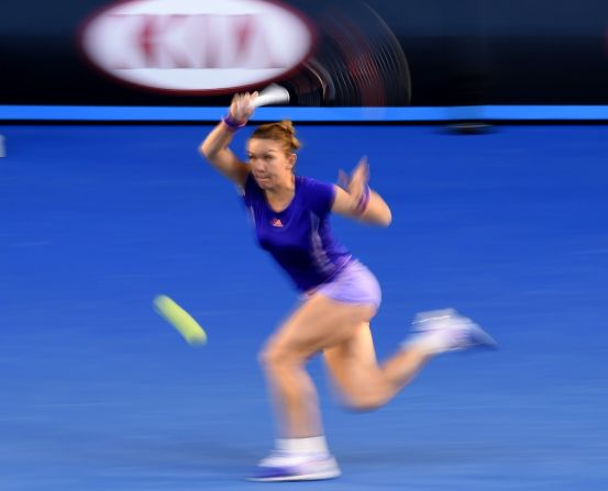 Simona Halep is captured on the run during her straight sets win over Yanina Wickmayer of Belgium to reach the quarterfinals.