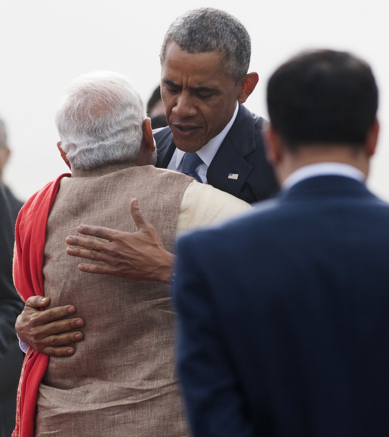  Modi hugs Obama after Obama's arrival in New Delhi.