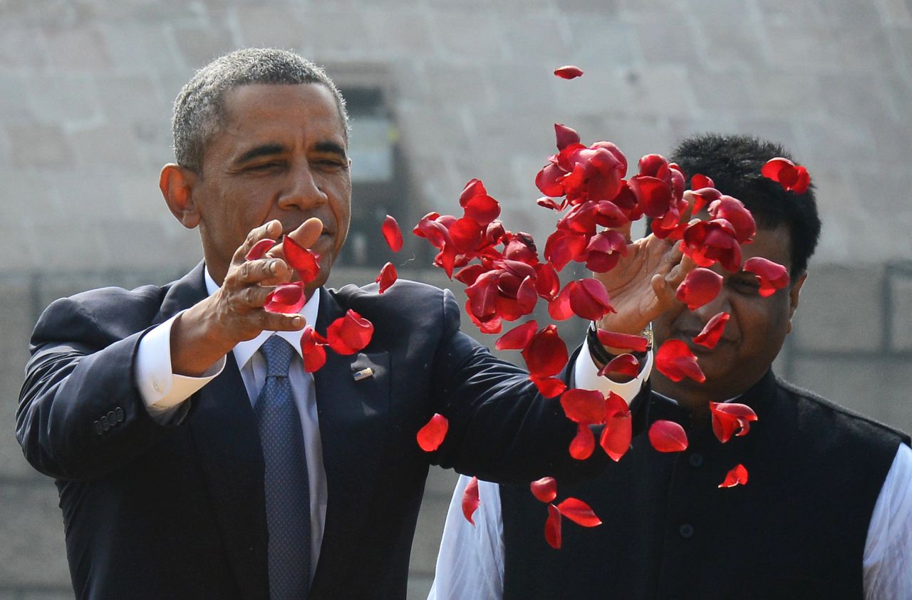 Obama offers a floral tribute at the site where Indian independence icon Mahatma Gandhi was cremated in New Delhi.