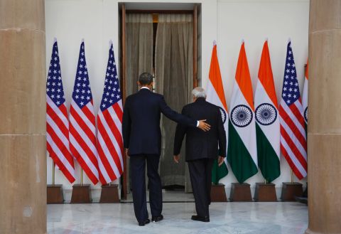 Obama and Modi walk into Hyderabad House for a meeting.
