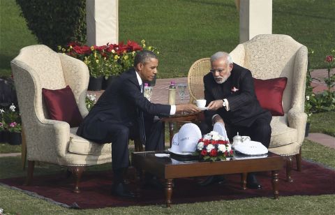Obama and Modi sit down for tea after a stroll in the gardens of Hyderabad House on January 25.