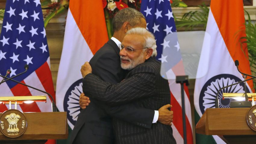 Obama and Modi hug  fter they jointly addressed the media after talks, in New Delhi.