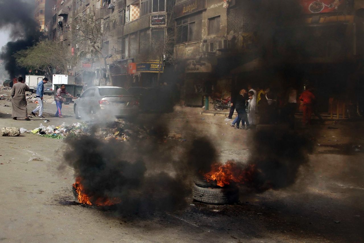 Protesters burn tires in Matariyah on January 25.