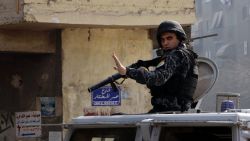 Egyptian security forces deploy in the Cairo suburb of Matariyah, Egypt, Sunday, Jan. 25, 2015.