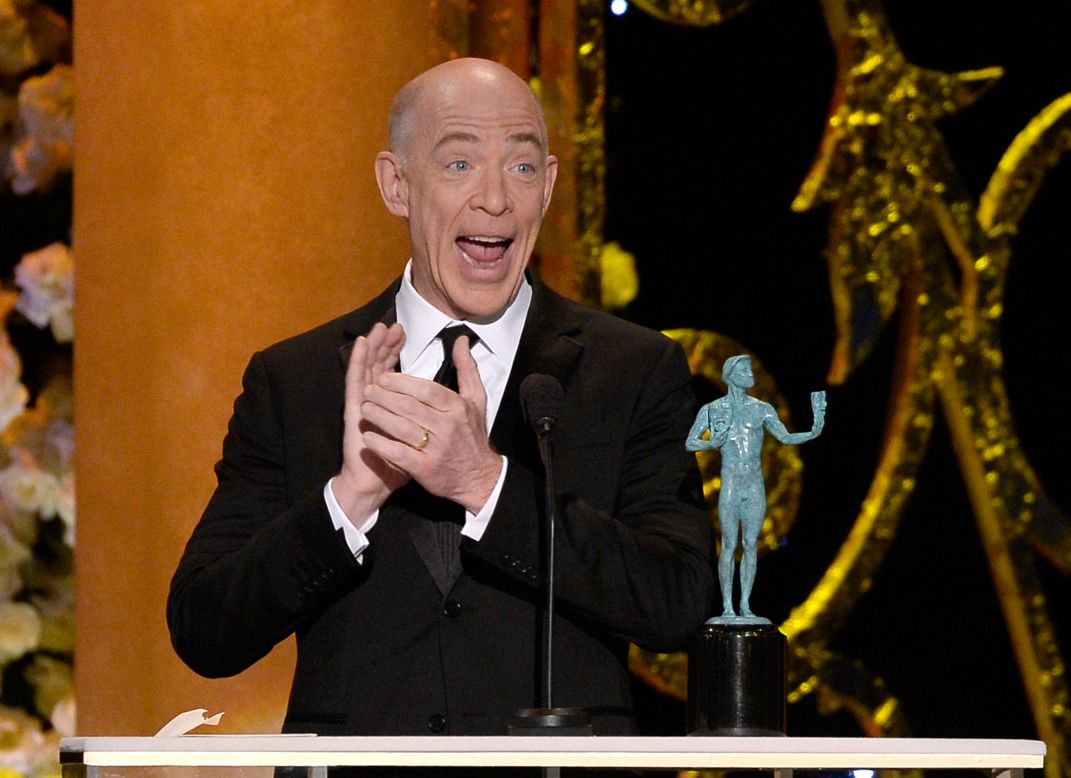 "Whiplash" star J. K. Simmons accepts the award for outstanding actor in a supporting role.