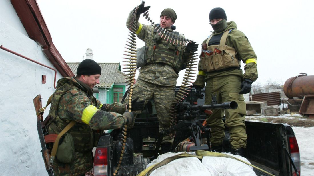 Ukrainian servicemen prepare ammunition at a position on the front line near Mariupol on January 26.