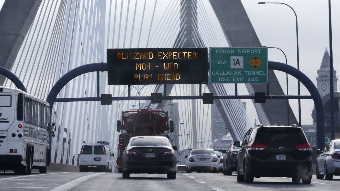 Commuters travel across the Zakim Bunker Hill Bridge into downtown Boston on January 26.