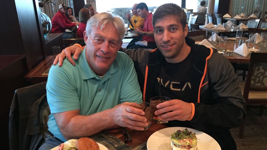 Ferguson and his dad toast on their trip to Atlanta for the 2014 SEC championship game.
