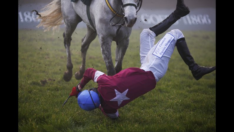 Ger Fox falls from Ipos Du Berlais during a race Thursday, January 22, at Gowran Park Racecourse in Kilkenny, Ireland.