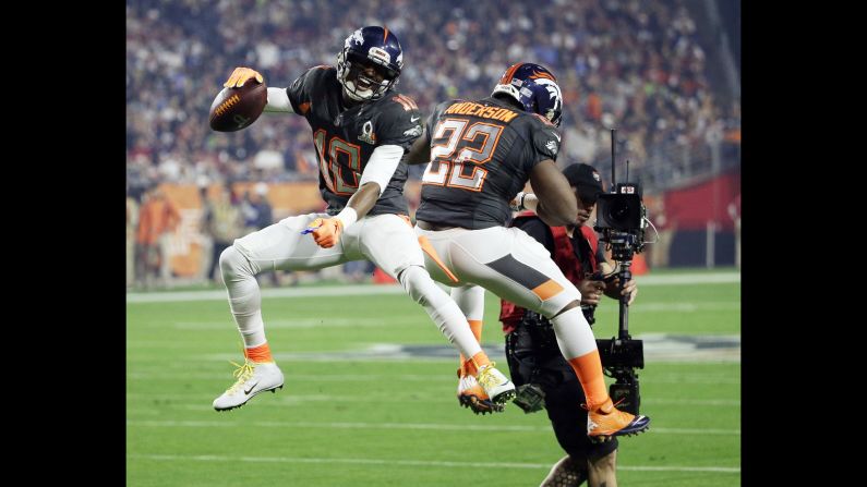 Emmanuel Sanders celebrates with his Denver Broncos teammate, C.J. Anderson, after scoring a touchdown in the Pro Bowl on Sunday, January 25. The annual all-star game was played in Glendale, Arizona.