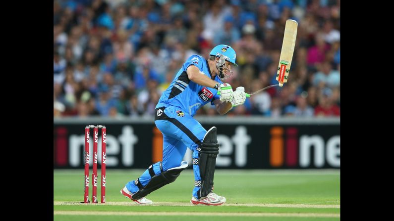Craig Simmons, a cricketer for the Big Bash League's Adelaide Strikers, breaks his bat as he plays a shot during a league semifinal match Saturday, January 24, in Adelaide, Australia. Adelaide lost to the Sydney Sixers by 87 runs.