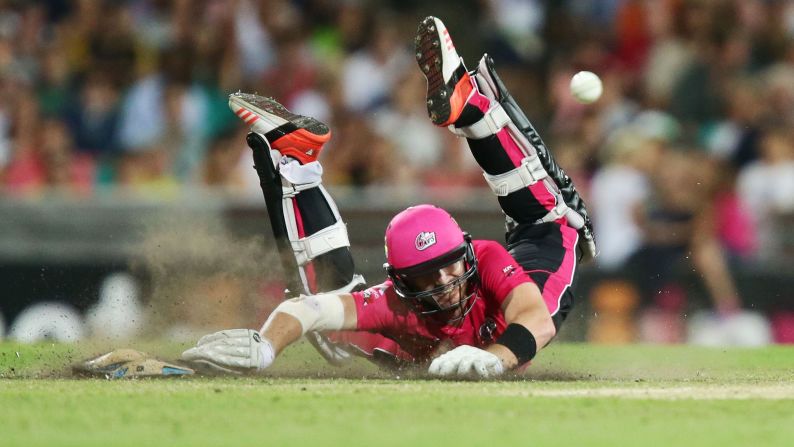 Batsman Riki Wessels of the Sydney Sixers slides to avoid a runout during a Big Bash League cricket match against the Sydney Thunder on Thursday, January 22.