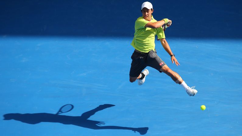 Kei Nishikori hits a shot Monday, January 26, during a fourth-round match at the Australian Open.
