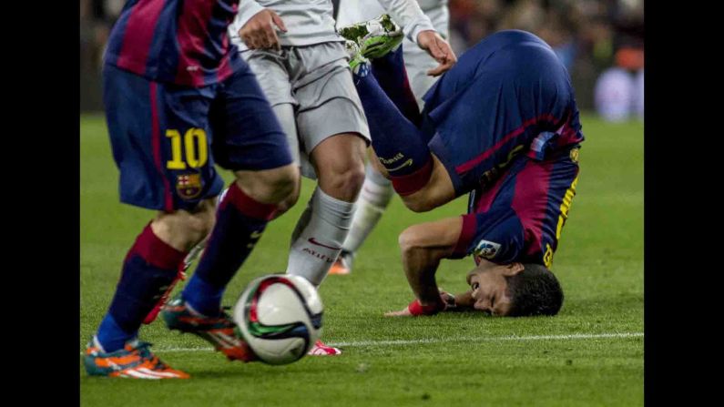 Barcelona's Luis Suarez falls on his face during a Copa del Rey quarterfinal match played Wednesday, January 21, in Barcelona, Spain. Barcelona defeated Atletico Madrid 1-0 in what was the first of a two-legged quarterfinal.  