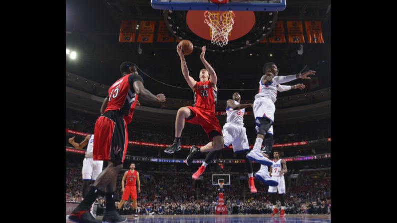Toronto's Tyler Hansbrough rises for a layup during an NBA game in Philadelphia on Friday, January 23.